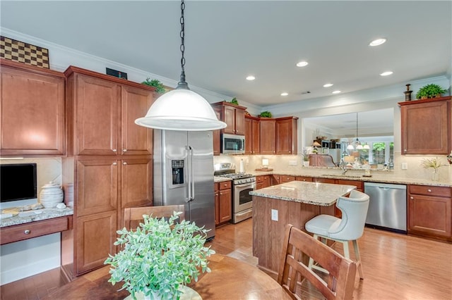 4460 Delano Dr, Cumming, GA 30040 - kitchen featuring appliances with stainless steel finishes, brown cabinets, backsplash, light wood finished floors, and crown molding