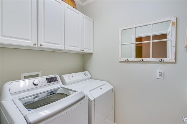 4460 Delano Dr, Cumming, GA 30040 - laundry room with cabinet space, washing machine and dryer, and crown molding