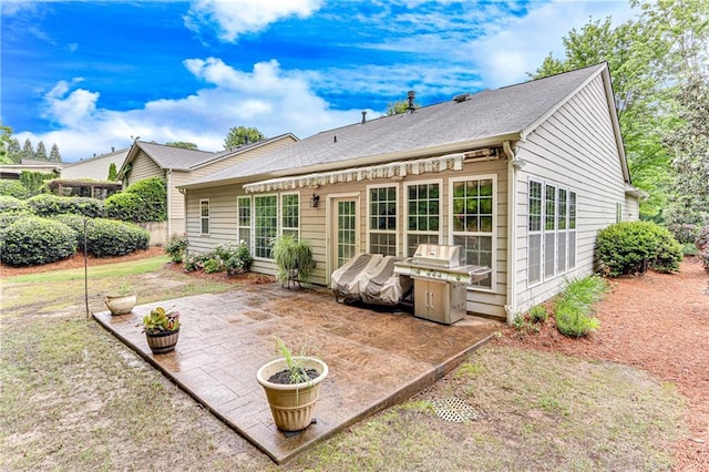 4460 Delano Dr, Cumming, GA 30040 - back of property with a patio