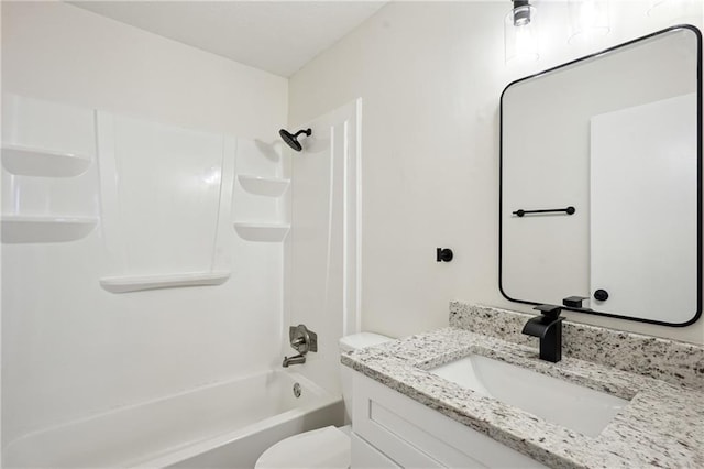 full bathroom featuring shower / bathing tub combination, toilet, and vanity