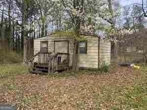 view of outbuilding featuring an outdoor structure