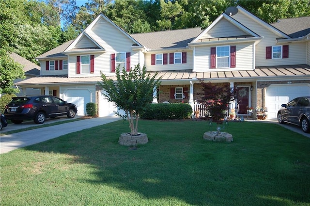 70 Darbys Crossing Ct, Hiram, GA 30141 - view of front of house featuring a garage, covered porch, a front yard, concrete driveway, and brick siding