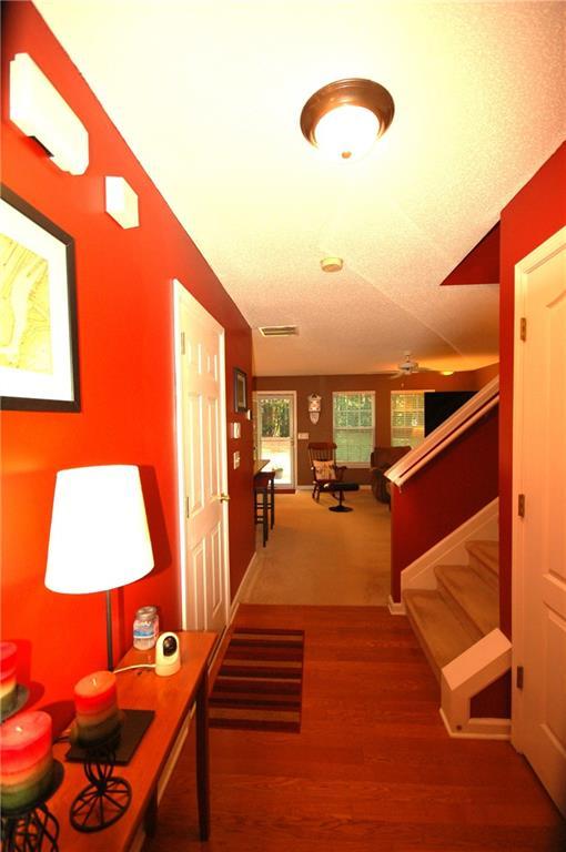 70 Darbys Crossing Ct, Hiram, GA 30141 - hall featuring stairway and wood finished floors