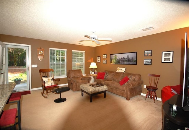 70 Darbys Crossing Ct, Hiram, GA 30141 - living room featuring carpet flooring, baseboards, and a ceiling fan