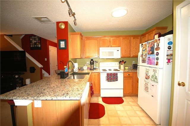 70 Darbys Crossing Ct, Hiram, GA 30141 - kitchen featuring white appliances, a sink, a peninsula, light floors, and light stone countertops