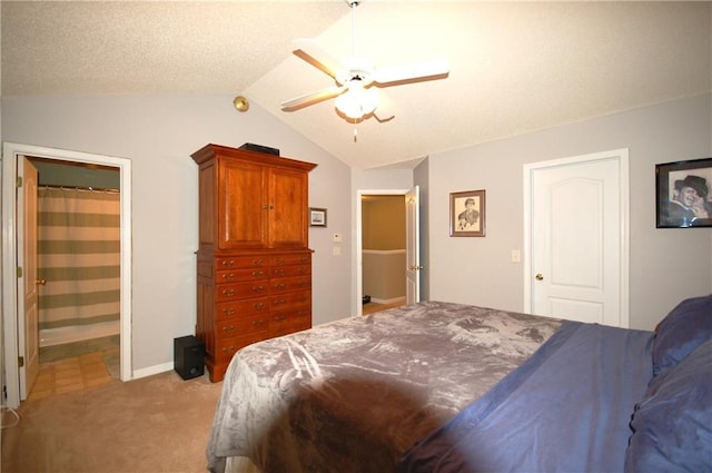 70 Darbys Crossing Ct, Hiram, GA 30141 - bedroom with lofted ceiling, light colored carpet, ceiling fan, baseboards, and ensuite bathroom