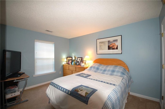 70 Darbys Crossing Ct, Hiram, GA 30141 - carpeted bedroom with baseboards and a textured ceiling