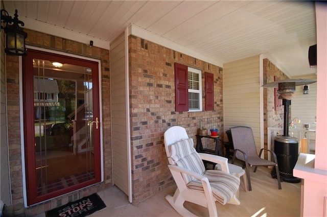 70 Darbys Crossing Ct, Hiram, GA 30141 - doorway to property featuring covered porch and brick siding