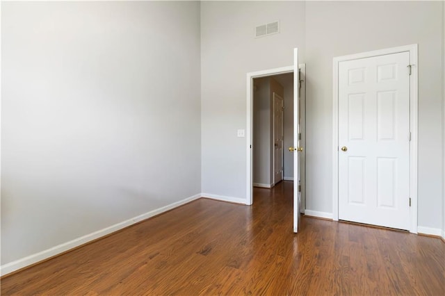 5351 Paramount View Way, Sugar Hill, GA 30518 - unfurnished room with wood finished floors and a high ceiling