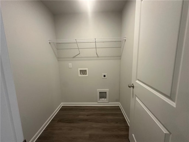 washroom featuring dark wood-style flooring, laundry area, hookup for a washing machine, baseboards, and electric dryer hookup