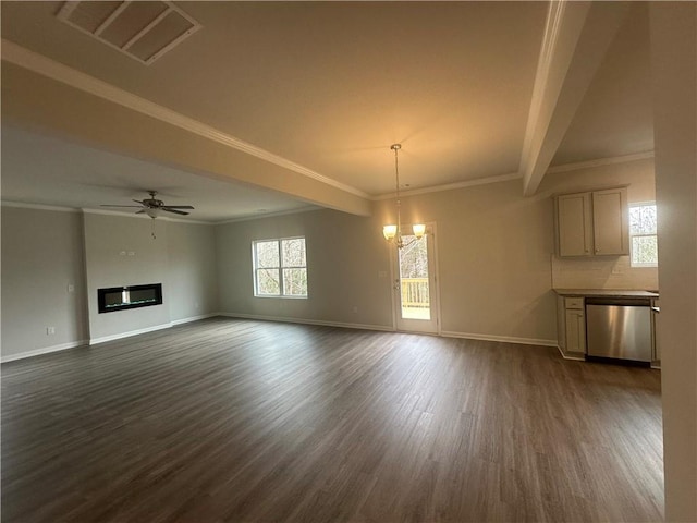 unfurnished living room with visible vents, baseboards, crown molding, and dark wood-style floors
