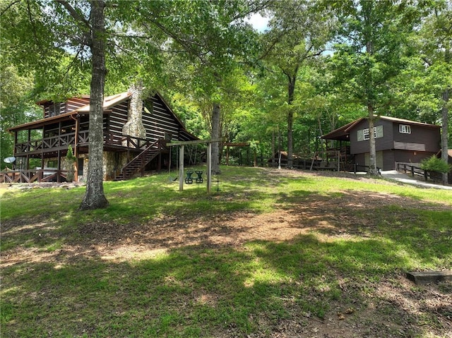 212 Dogpatch Ln, Blue Ridge, GA 30513 - view of green lawn with stairs and a deck