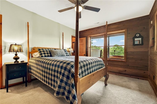 212 Dogpatch Ln, Blue Ridge, GA 30513 - bedroom featuring wood walls, light carpet, and ceiling fan
