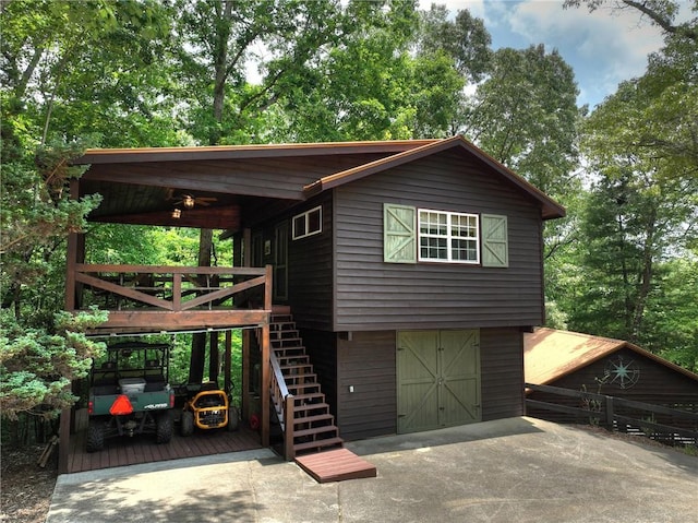212 Dogpatch Ln, Blue Ridge, GA 30513 - chalet / cabin with stairs, driveway, and a deck