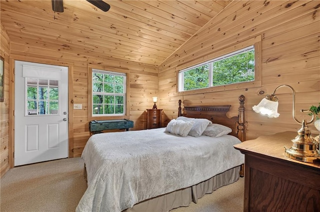 212 Dogpatch Ln, Blue Ridge, GA 30513 - carpeted bedroom with lofted ceiling, wood walls, and a ceiling fan