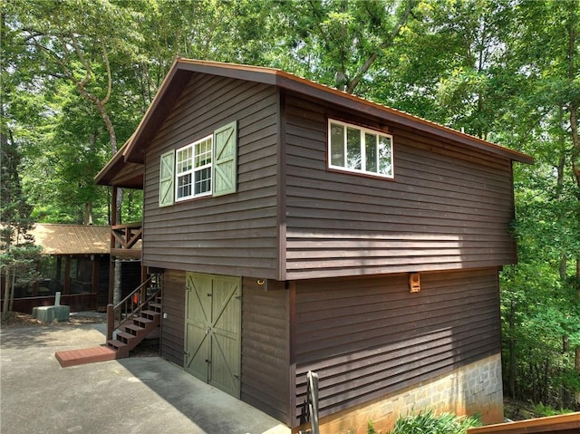212 Dogpatch Ln, Blue Ridge, GA 30513 - view of property exterior with stairs and central AC unit