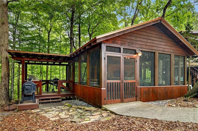 212 Dogpatch Ln, Blue Ridge, GA 30513 - view of side of home featuring a sunroom and a deck
