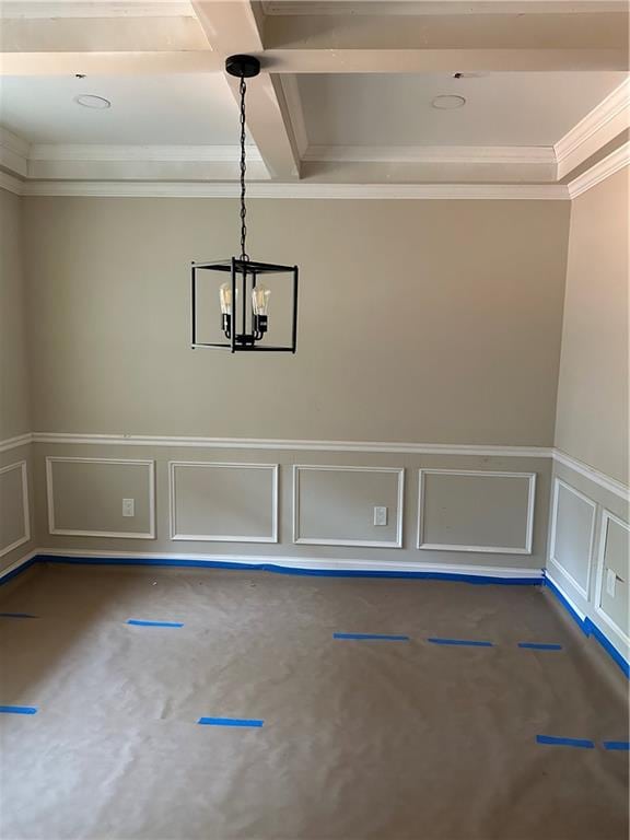 unfurnished dining area with crown molding and an inviting chandelier