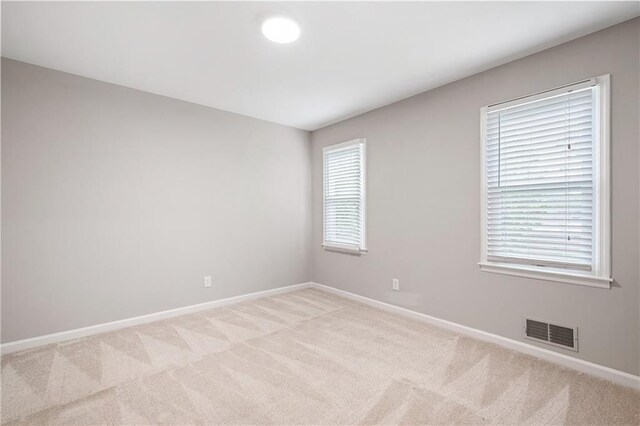 4497 Windsor Oaks Dr, Marietta, GA 30066 - spare room with light colored carpet