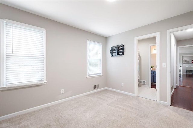4497 Windsor Oaks Dr, Marietta, GA 30066 - unfurnished bedroom featuring carpet and ensuite bathroom