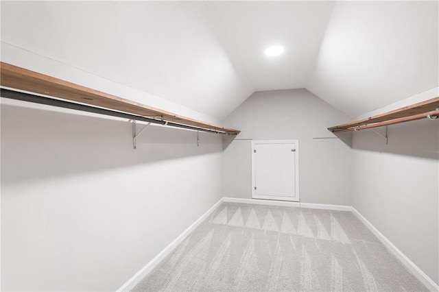 4497 Windsor Oaks Dr, Marietta, GA 30066 - walk in closet featuring lofted ceiling and light carpet