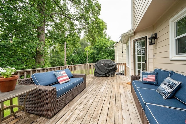 4497 Windsor Oaks Dr, Marietta, GA 30066 - wooden deck featuring area for grilling, an outdoor hangout area, and view of wooded area