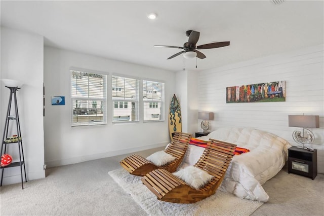 bedroom with carpet flooring, ceiling fan, and baseboards