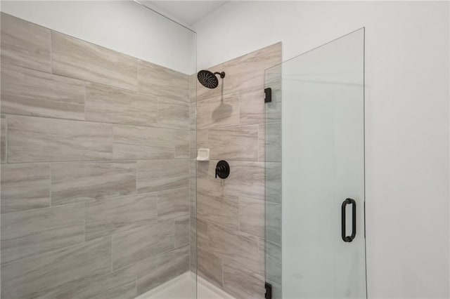 bathroom featuring a stall shower