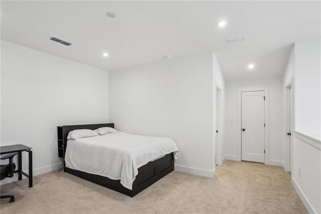 carpeted bedroom with visible vents, recessed lighting, and baseboards