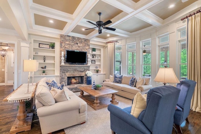 living room featuring crown molding, wood finished floors, a fireplace, beamed ceiling, and a ceiling fan