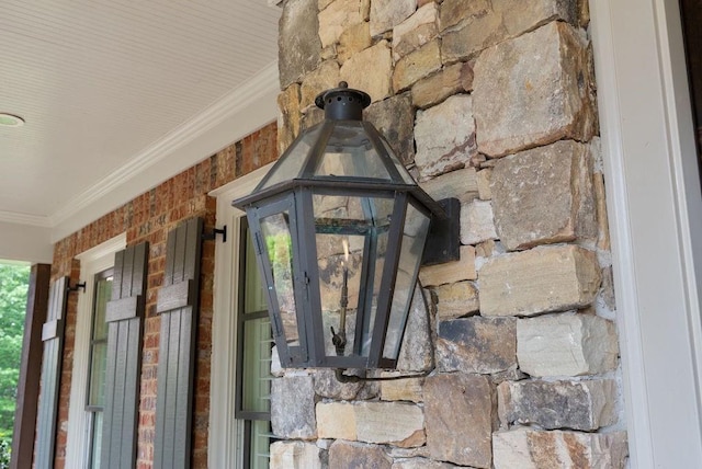 details featuring stone siding