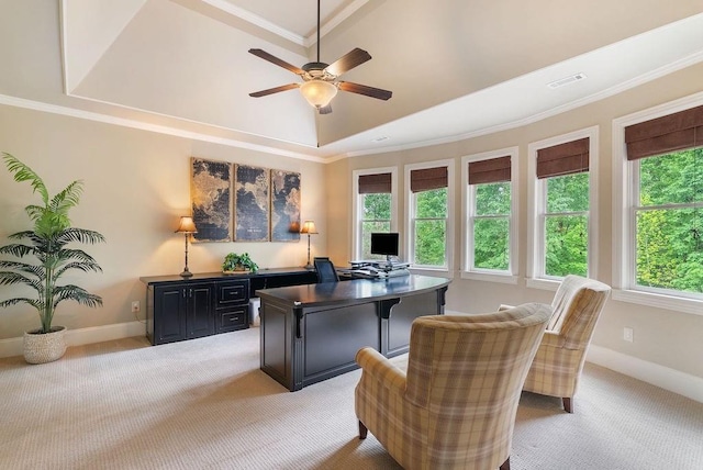 home office with visible vents, baseboards, ceiling fan, and light carpet
