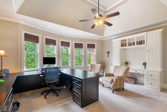 office area with visible vents, ornamental molding, a ceiling fan, and light colored carpet