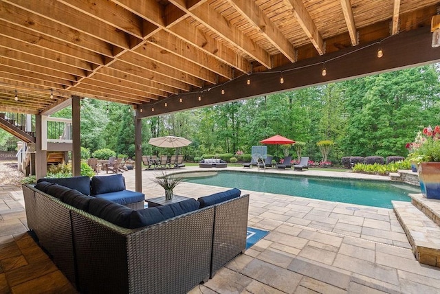 view of patio / terrace with outdoor dining area, an outdoor living space, and an outdoor pool