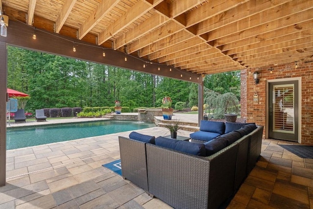 view of patio with an outdoor pool and an outdoor hangout area
