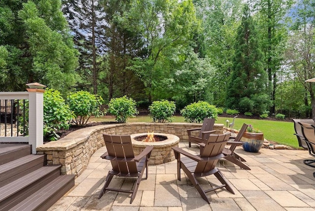 view of patio featuring a fire pit