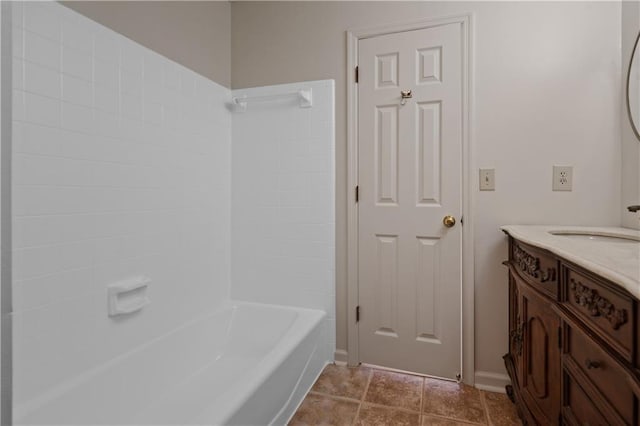 full bath with  shower combination, tile patterned flooring, and vanity