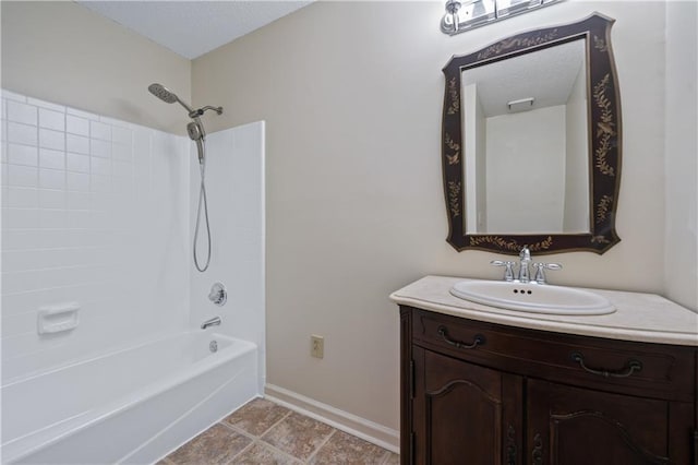 bathroom with shower / bath combination, vanity, baseboards, and tile patterned floors