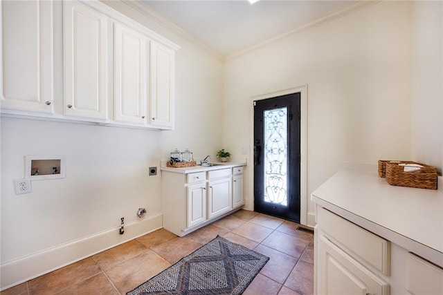 washroom with electric dryer hookup, cabinets, gas dryer hookup, crown molding, and hookup for a washing machine