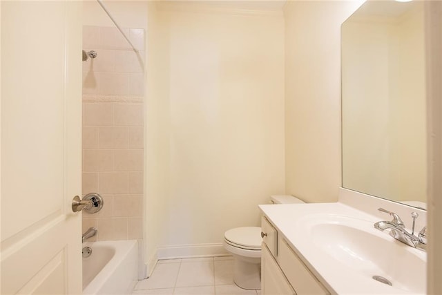 full bathroom with toilet, vanity, tiled shower / bath, and tile patterned floors