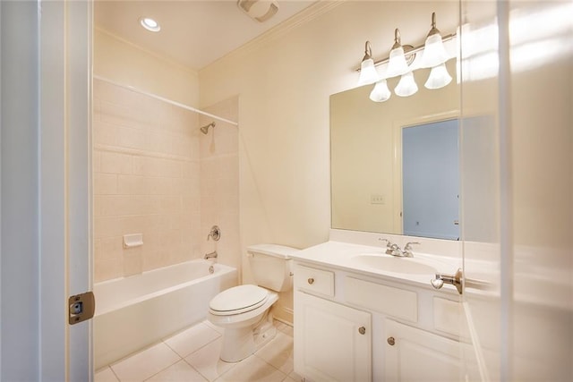 full bathroom featuring tile patterned floors, crown molding, vanity, toilet, and tiled shower / bath