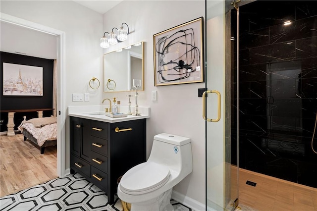 bathroom with toilet, connected bathroom, a shower stall, baseboards, and vanity