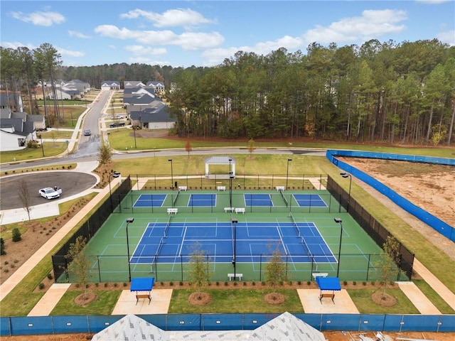 view of sport court with fence