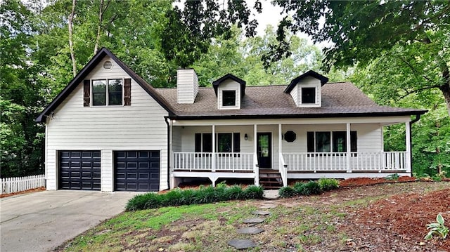 view of front facade featuring a garage and a porch