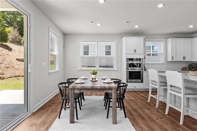 4011 Fallen Leaf Ct, Kennesaw, GA 30152 - dining area with recessed lighting, light wood finished floors, and baseboards