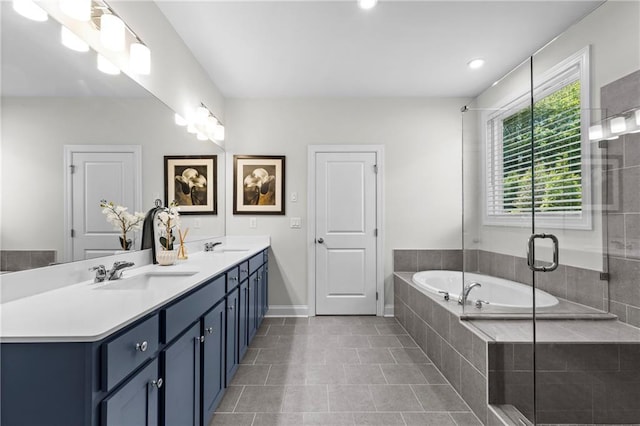 4011 Fallen Leaf Ct, Kennesaw, GA 30152 - bathroom with a bath, double vanity, tile patterned floors, baseboards, and a shower with shower door