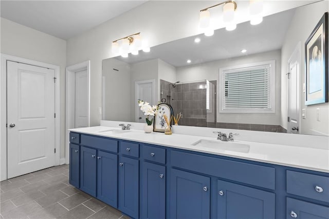 4011 Fallen Leaf Ct, Kennesaw, GA 30152 - bathroom with double vanity, a tile shower, and tile patterned flooring