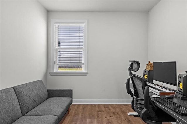 4011 Fallen Leaf Ct, Kennesaw, GA 30152 - office area with wood finished floors, healthy amount of natural light, and baseboards