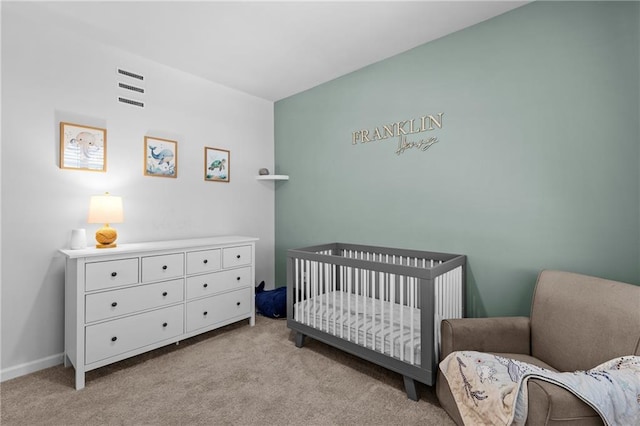 4011 Fallen Leaf Ct, Kennesaw, GA 30152 - bedroom with light carpet, a crib, and baseboards