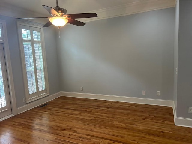 2380 Crescent Park Ct Unit 4, Atlanta, GA 30339 - spare room featuring crown molding, wood finished floors, baseboards, and a ceiling fan